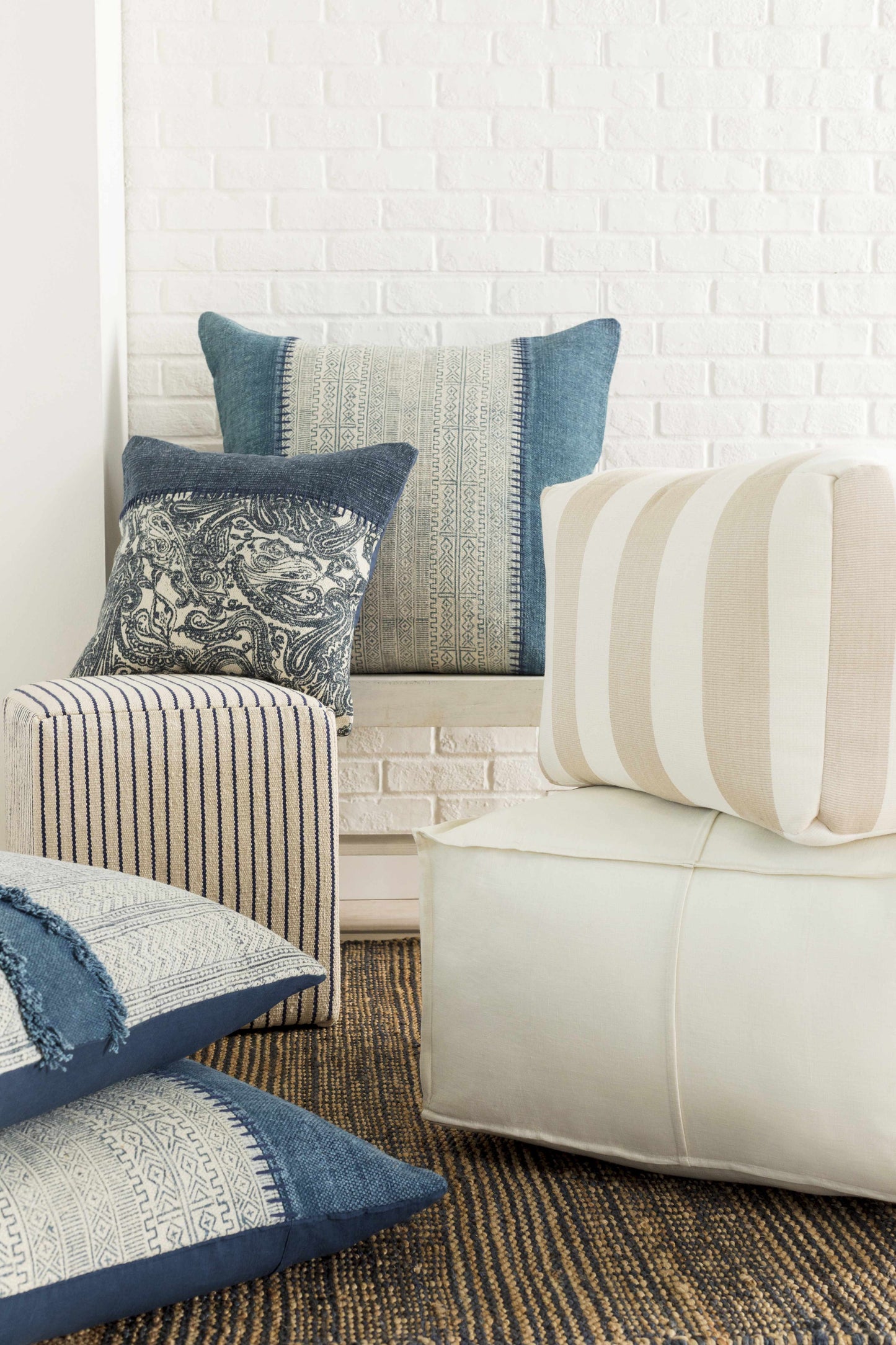 Friendsville Solid & Striped Ivory Pouf